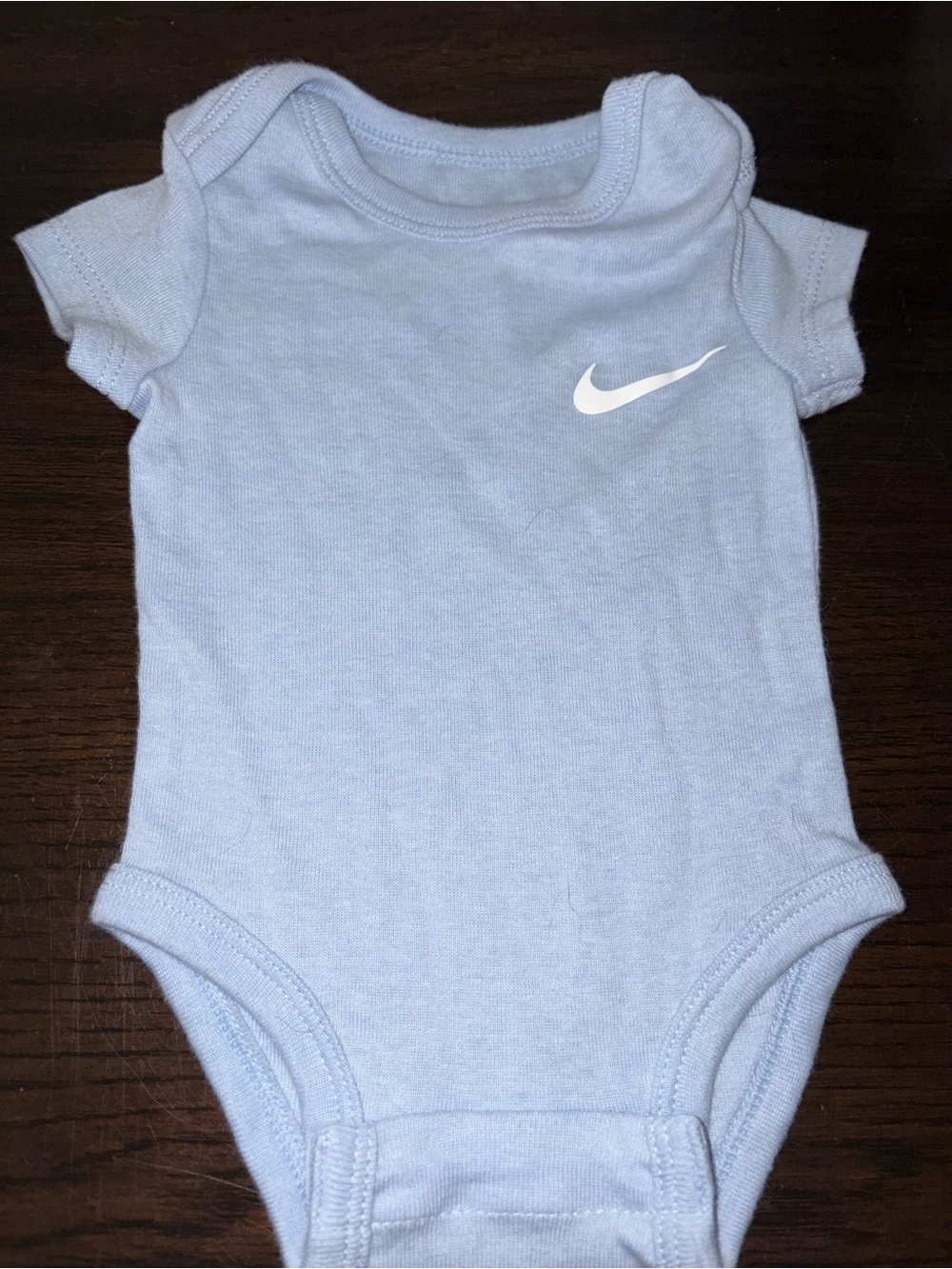 Nike Light Blue Infant Bodysuit with White Swoosh